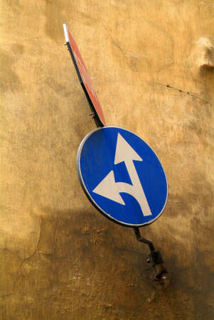 blue board with white arrrowの写真素材