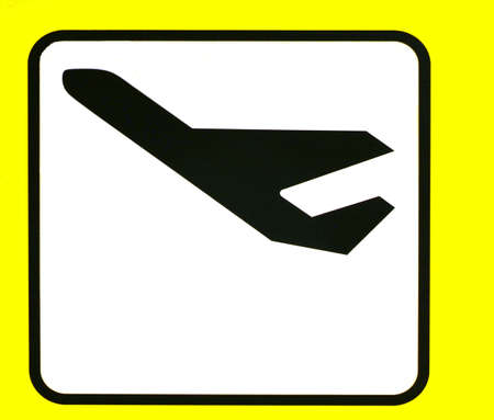 a yellow sign with a airplane departuresの写真素材