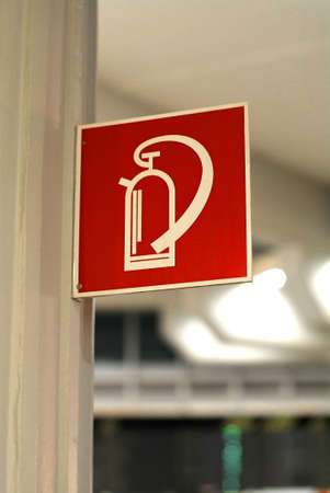 fire exiting buckler on a white wallの写真素材