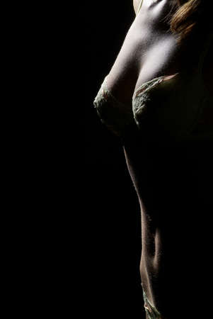 women over body with bosom with a black braの写真素材