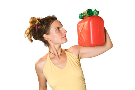 a young woman looks to the red jerry can
