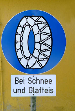 traffic sign using snow chain when snowimg or iceの写真素材