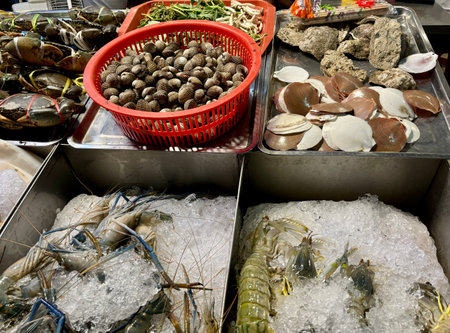 Shrimps, mussels, crabs and shellfish in marketの写真素材