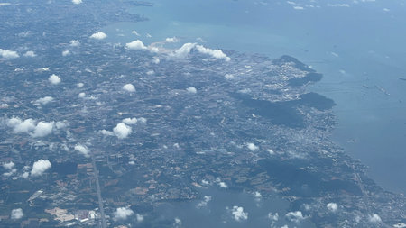Aerial view of the city of Bangkok from the airplane window.の写真素材