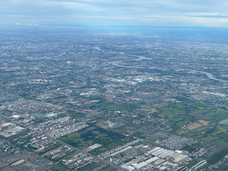 Aerial view of the city of Bangkok, Thailand from a planeの写真素材