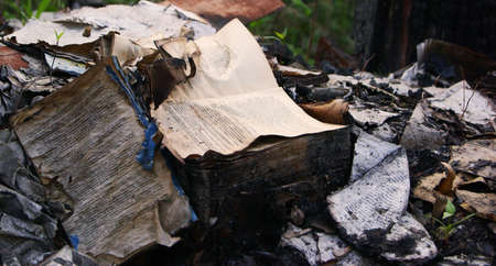 Burnt the book in a ruined house after the fireの写真素材