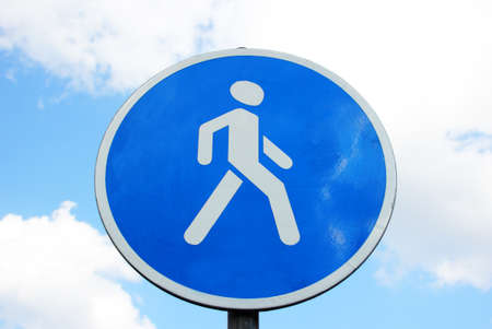 road sign on sky background and cloudsの写真素材