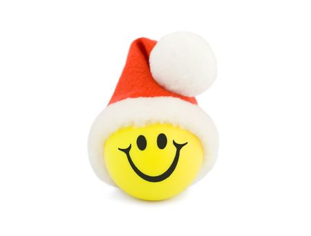 Christmas Smiling Tennis Ball in christmas hat の写真素材