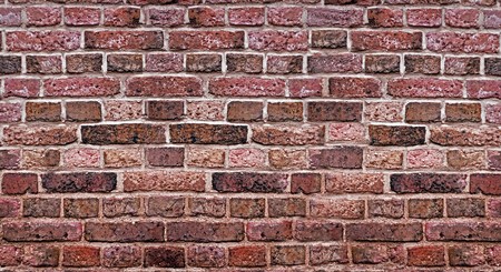 old weathered stained red brick wall background