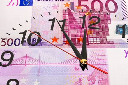 Time is money concept  Clock on euro banknote