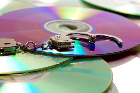 handcuffs in pile pirate CDの写真素材