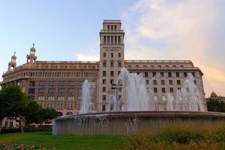 Bank and fountain Catalonia Plaza in Barcelona, Spainのeditorial素材