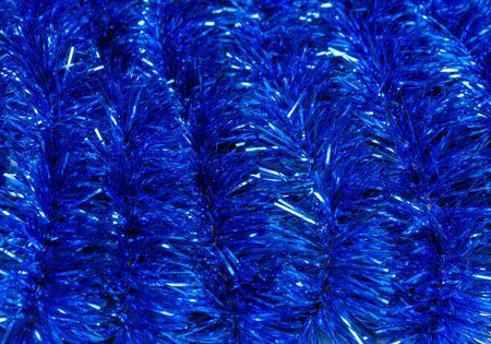 Festive curly ribbons blue backgroundの写真素材