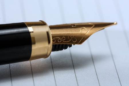 fountain pen gold with notebook の写真素材