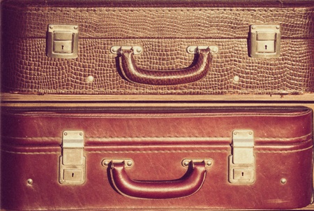 Vintage battered brown suitcases traveの写真素材