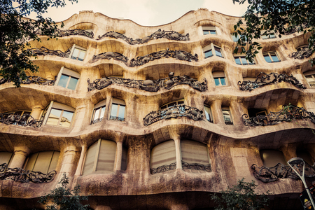 BARCELONA, SPAIN - AUGUST 24: Modernism style architecture. Casa Mila aka La Pedrera (Catalan for 'The Quarry') on August 24 2012. This house was built during 1906 - 1910.のeditorial素材