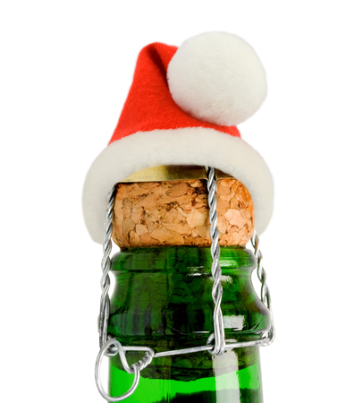 Santa Claus red hat in Champagne Bottle isolatedの写真素材