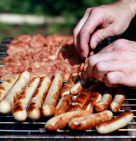 meat and sausages on the grill  backgroundの写真素材