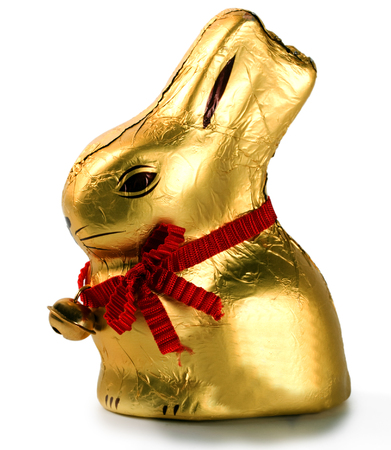 chocolate easter hare with sleigh bell goldの写真素材
