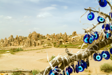 Tree and evil eye amulet in Cappadocia Turkeyの写真素材