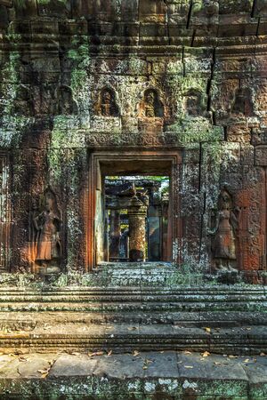 dancing Stone Carving Ruins of Angkor Wat, part of Khmer temple complex, Asia. Siem Reap, Cambodia. Ancient Khmer architecture in jungle.の写真素材