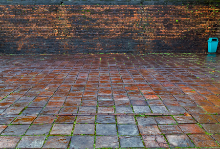 red brick dirty old wall and box garbageの写真素材