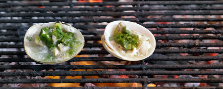 Grill mollusk, mussel cooking seafood street food and beach bbqの写真素材