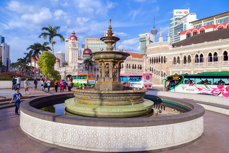 KUALA LUMPUR, MALAYSIA - FEBRUARY 21, 2015 - View of the historic city centre in Kuala Lumpur, fountain and Sultan Abdul Samad building Merdeka Square at Exterior of the buildings at the Independence square, Kuala Lumpur, Malaysiaのeditorial素材