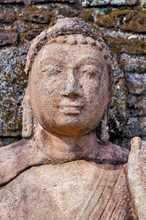 Ancient ruins Buddha in Polonnaruwa city temple - medieval capital of Ceylon,   Sri Lankaの写真素材