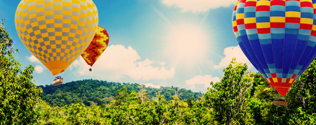 Sunlight shining in tropical jungle landscape, vintage nature backgroundの写真素材