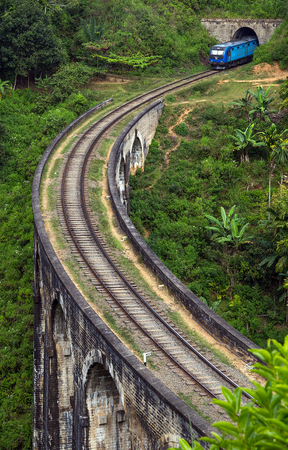 train, running on the Railway Viaduct Nine Arches Bridge in Demodara, Sri Lankaのeditorial素材