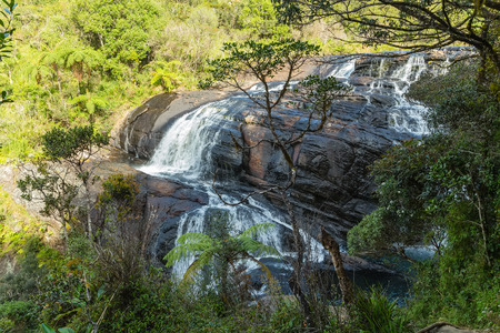 Waterfall Panoramic rocks Bakerâ€™s Falls in Horton Plains National Park Sri Lanka.