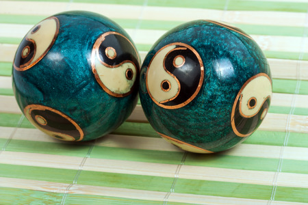 Baoding Chinese relax balls for relaxation on bamboo backgroundの写真素材