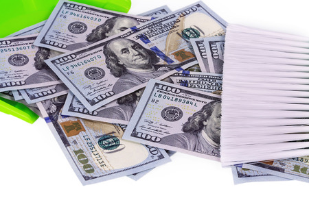 concept garbage cash money banknote in the shovel on the white backgroundの写真素材