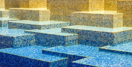 Texture blue glass mosaic tile background, Water wave swimming pool with reflectingの写真素材