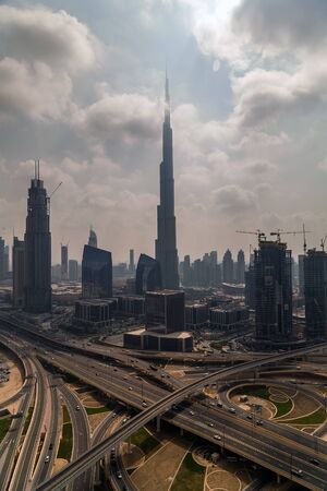 DUBAI, UAE - JANUARY 26, 2016: Skyscrape Panorama aerial view of downtown Dubai Burj Khalifa. Dubai car traffic, busy roads Sheikh Zayed.のeditorial素材