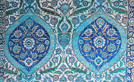 Ancient Ottoman patterned tiles background with oriental ornaments Turkish. Blue Tiles decorative element.のeditorial素材