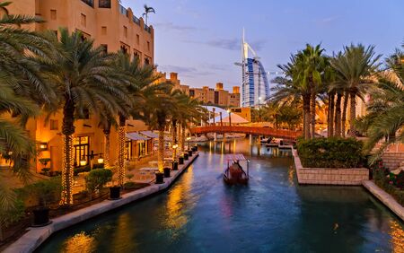 Dubai, UAE, January 26, 2016: Souk Madinat Jumeirah Dubai Traditional boat safari Night life, View of Burj Al Arab.のeditorial素材