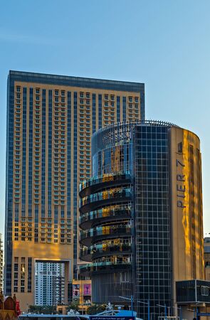 DUBAI, UAE - January 25, 2016: Dubai skyscrapers, hotels near The Walk at JBR buildings on Dubai Marina World Tallest Tower travel and tourism Dubai, United Arab Emiratesのeditorial素材
