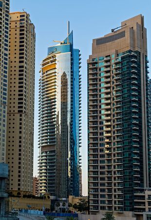 DUBAI, UAE - January 24, 2016: Dubai Marina bay view skyscrapers, modern cityscape, downtown with blue sky, city at Middle East, Dubai, United Arab Emirate.のeditorial素材
