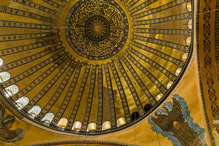 Istanbul, Turkey â May 01, 2014: Fragment of the ceiling painting of the Hagia Sophia patchwork Topmost dome. Detail of the top of the dome, decorated with the beginning of the Quranic verse of lightのeditorial素材