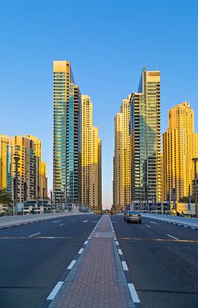 DUBAI, UAE - January 25, 2016: Dubai skyscrapers, Modern buildings on Dubai Marina travel and tourism Dubai, United Arab Emiratesのeditorial素材