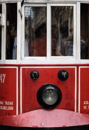 ISTANBUL, TURKEY - MAY 05, 2014: The Istanbul nostalgic red tramways heritage red vintage electric, Taksim Istiklal Street is a popular destination. Istanbul, Turkey.のeditorial素材