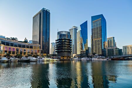 DUBAI, UAE - January 25, 2016: Dubai skyscrapers, Modern buildings on Dubai Marina World Tallest Tower travel and tourism Dubai, United Arab Emiratesのeditorial素材