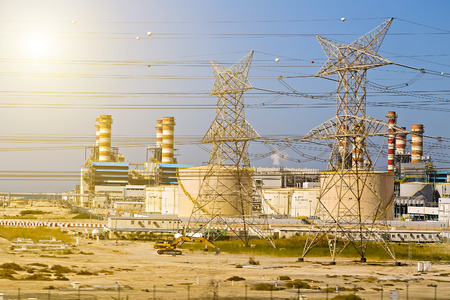 Power High voltage lines electrical wires Pillar sand desert landscape, UAE, Dubai