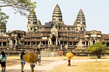 SIEM REAP, CAMBODIA - March 01, 2015: Angkor Wat is a popular tourist attraction doorway in the...