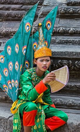 SIEM REAP, CAMBODIA - March 01, 2015: Traditional Cambodian Apsara dressed professional dancers, temples of Angkor Wat is a popular tourist attraction.のeditorial素材