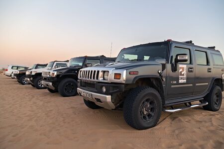DUBAI, UNITED ARAB EMIRATES - JANUARY 25, 2016: Safari Off-road motor car Hummer H2 rally sand desert landscape, UAE, Dubai.のeditorial素材