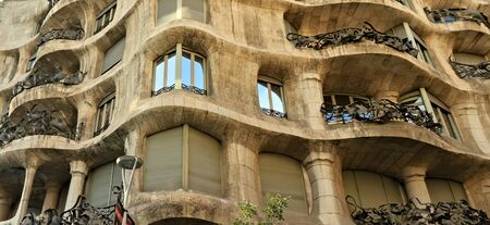 BARCELONA, SPAIN - August 03, 2012: House Famous building facade Casa Mila, popularly known as La...