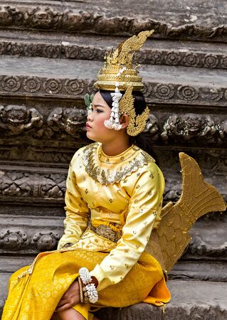 SIEM REAP, CAMBODIA - March 01, 2015: Traditional Cambodian Apsara dressed professional dancers, temples of Angkor Wat is a popular tourist attraction.のeditorial素材